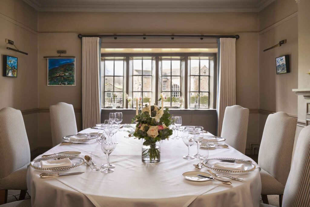 Smaller wedding reception table set for a wedding dinner