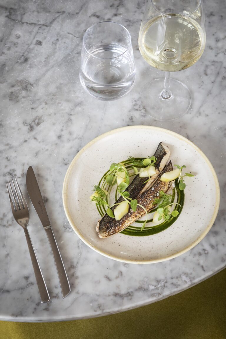 A fish starter on a marble effect table.