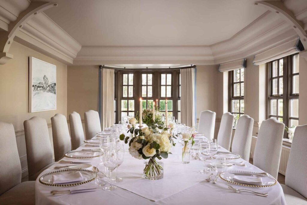 large wedding reception table set for 10 guests