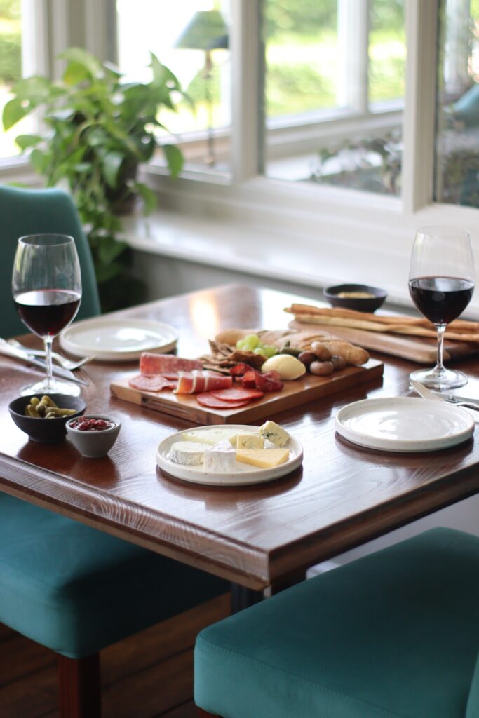 Table set with meats and cheese