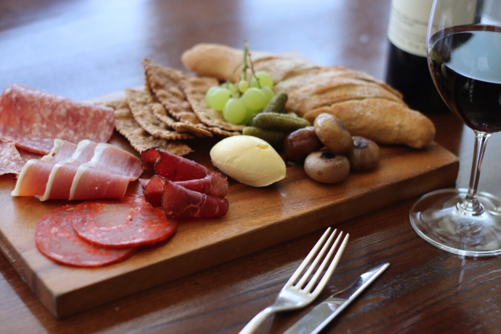 Close up board with selection of cured meat
