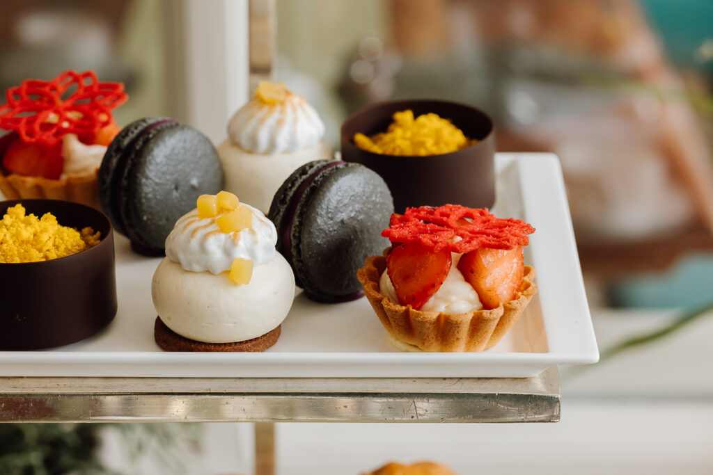 A selection of sweet treats on an afternoon tea stand.